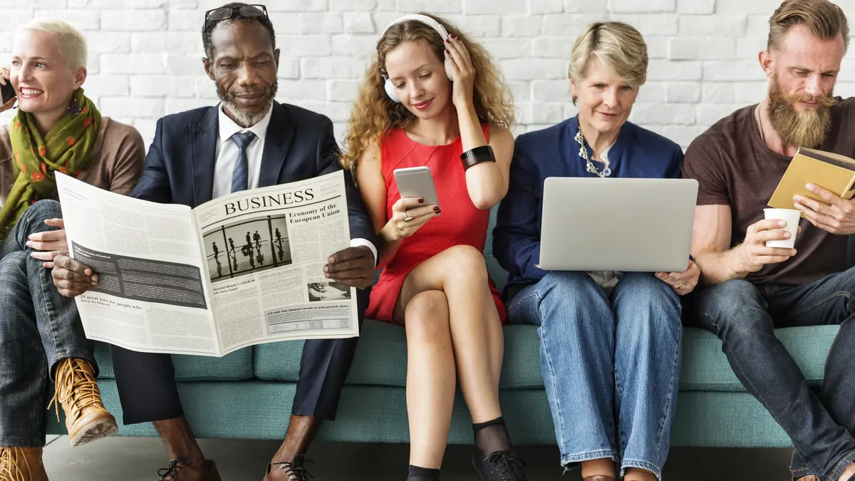 Group of people feeding their intellect by reading, talking, or listening.