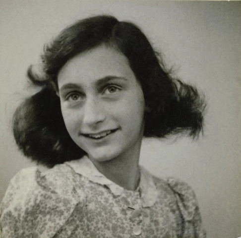 The last known photograph of Anne taken in May 1942, taken at a passport photo shoot.