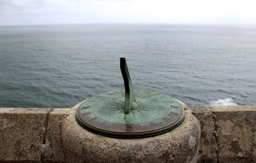 Sundial clock by the sea